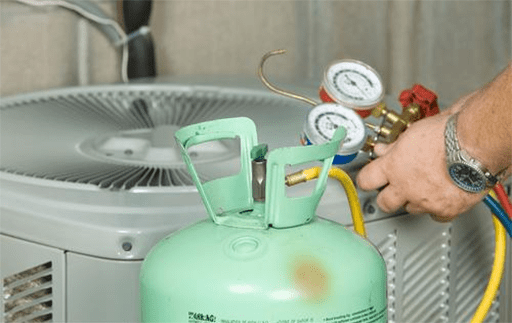 adding refrigerant to the air conditioner compressor